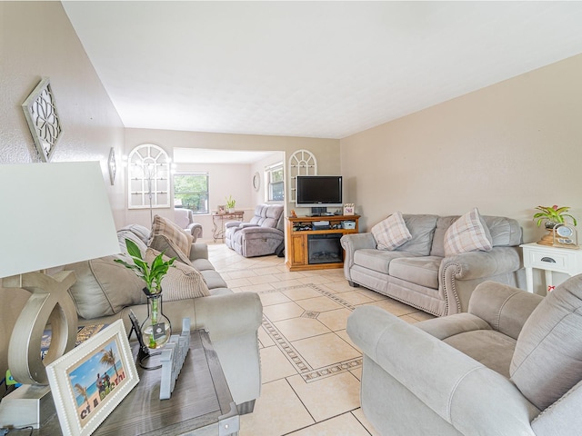 living area featuring light tile patterned flooring