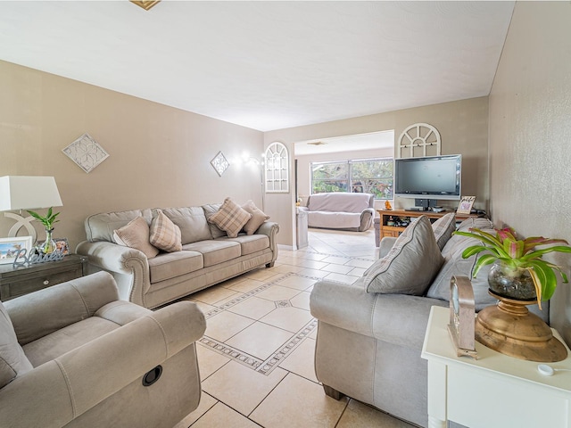 living room featuring light tile patterned floors