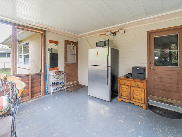 exterior space with freestanding refrigerator