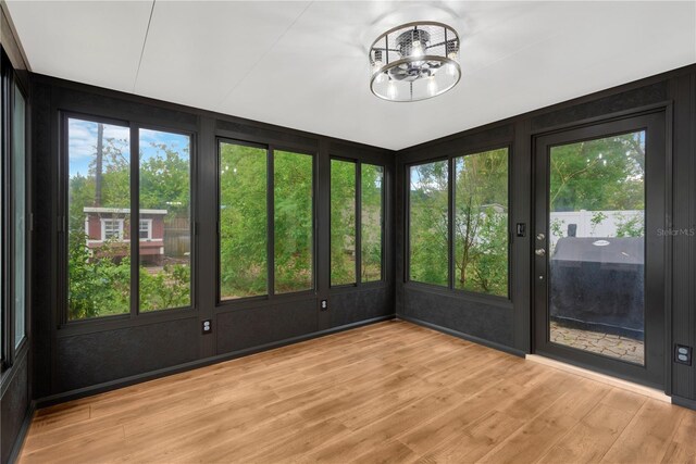 unfurnished sunroom with a healthy amount of sunlight