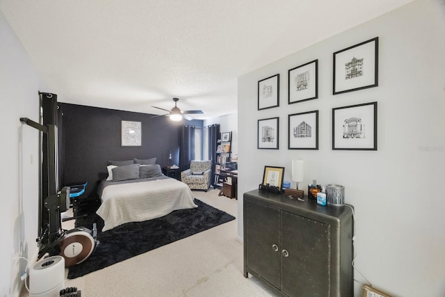 carpeted bedroom featuring a ceiling fan