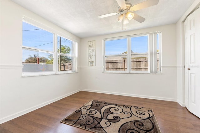 interior space featuring ceiling fan