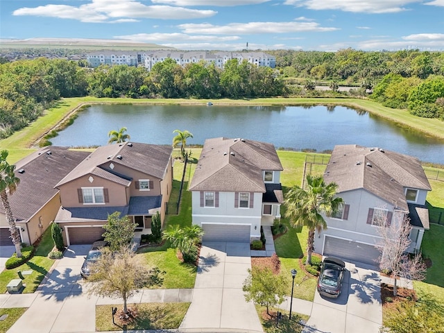 aerial view with a water view and a residential view