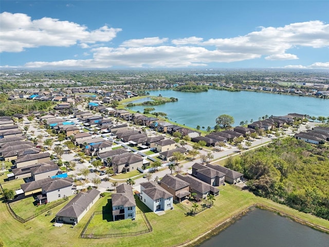 aerial view with a residential view and a water view