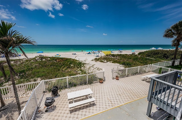 view of water feature with a beach view