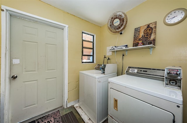 laundry room featuring laundry area and washer and clothes dryer