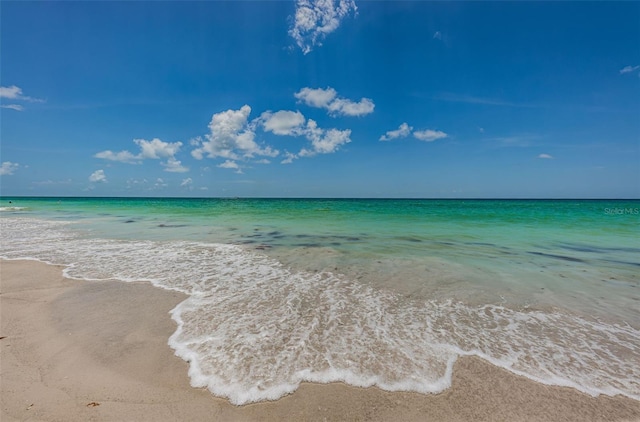 property view of water featuring a view of the beach