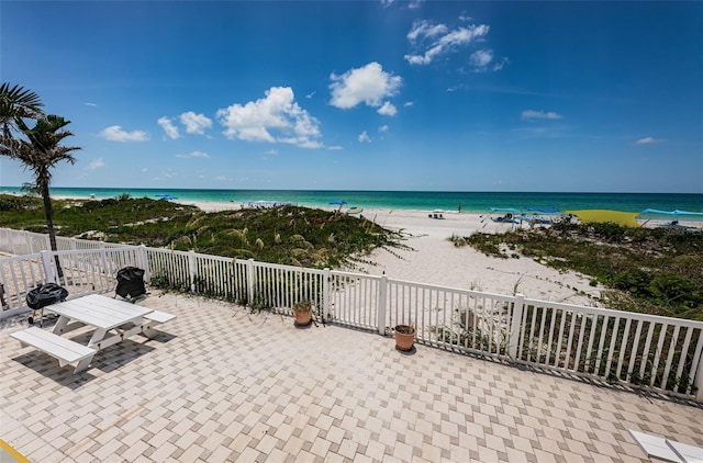 property view of water with a beach view