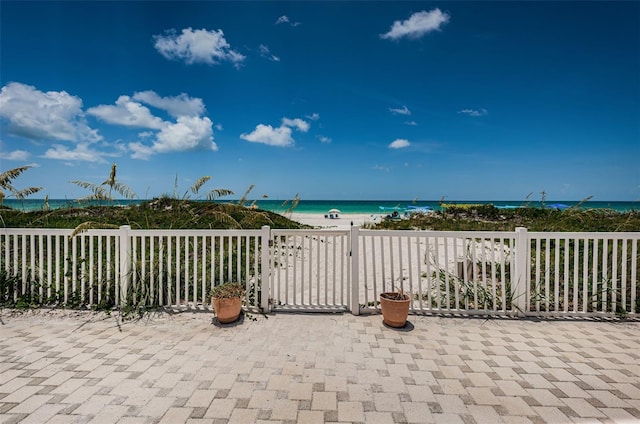 view of patio / terrace with a water view