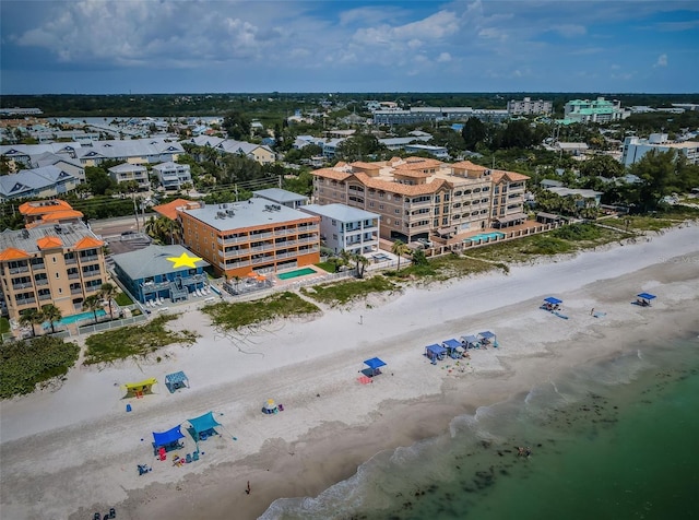 aerial view featuring a water view and a view of the beach