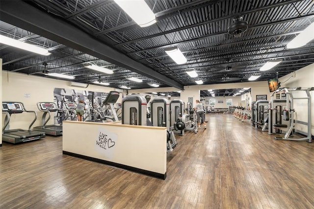 gym with wood-type flooring