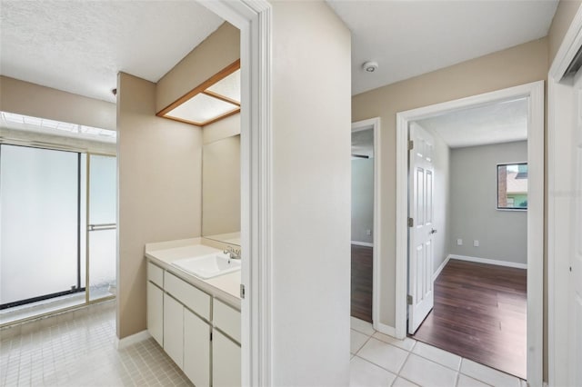 14048 Bruni Dr, Spring Hill, FL 34609 - bathroom with vanity and tile patterned floors