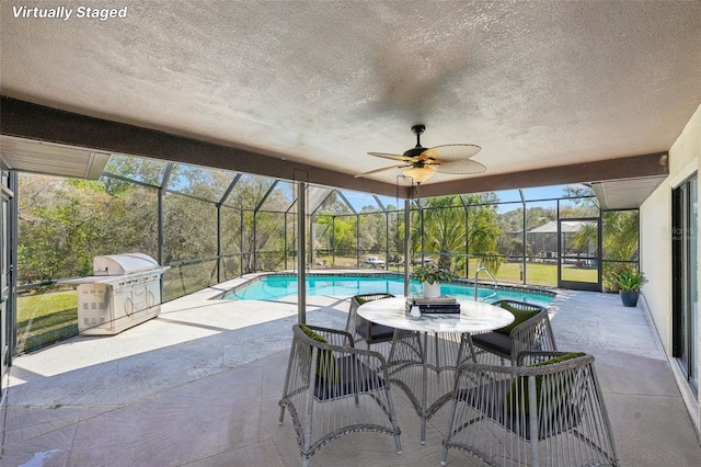 14048 Bruni Dr, Spring Hill, FL 34609 - swimming pool featuring a patio, a lanai, and a ceiling fan