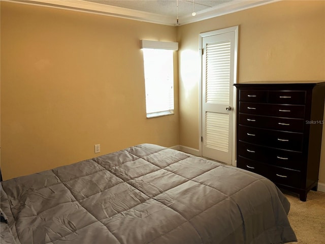 bedroom featuring light carpet and crown molding