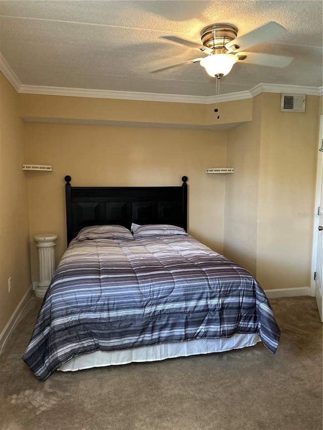 carpeted bedroom featuring visible vents, crown molding, baseboards, a textured ceiling, and a ceiling fan