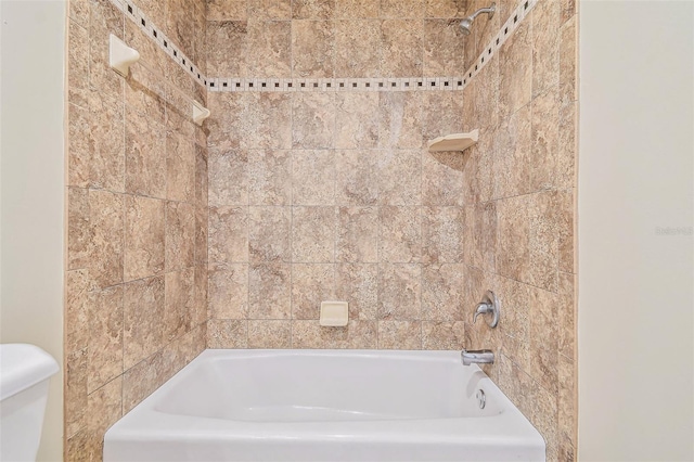 bathroom featuring toilet and shower / washtub combination