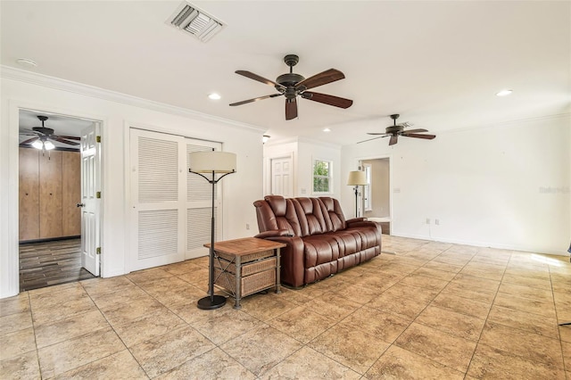 living area featuring recessed lighting, visible vents, baseboards, and crown molding