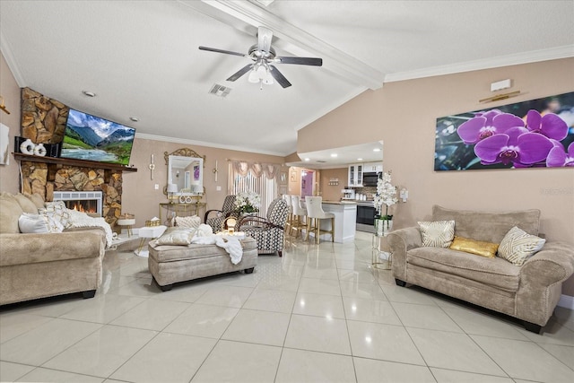 living area featuring lofted ceiling with beams, light tile patterned floors, a fireplace, and crown molding