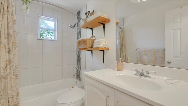 bathroom with shower / bath combo, vanity, and toilet