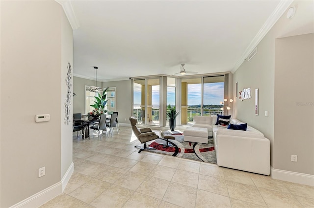 living room with expansive windows, ornamental molding, and baseboards