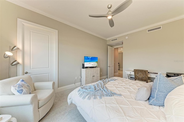 carpeted bedroom featuring ceiling fan, ornamental molding, visible vents, and baseboards