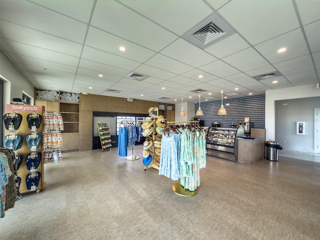 miscellaneous room with visible vents, a drop ceiling, and recessed lighting