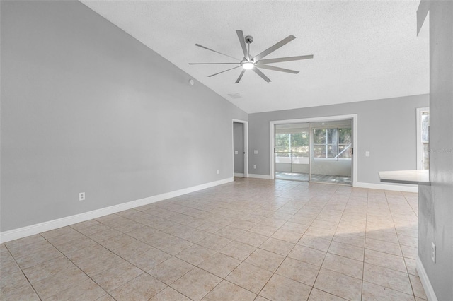 unfurnished room with ceiling fan, baseboards, a textured ceiling, and light tile patterned flooring