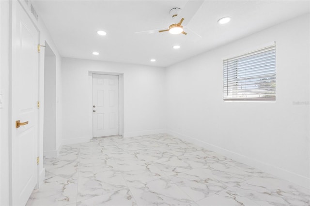 unfurnished room with marble finish floor, recessed lighting, visible vents, ceiling fan, and baseboards