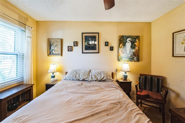 105 Country Club Ln, Mulberry, FL 33860 - bedroom featuring multiple windows, a textured ceiling, and a ceiling fan