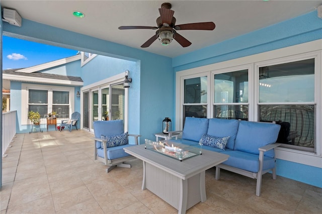 view of patio with ceiling fan and an outdoor hangout area