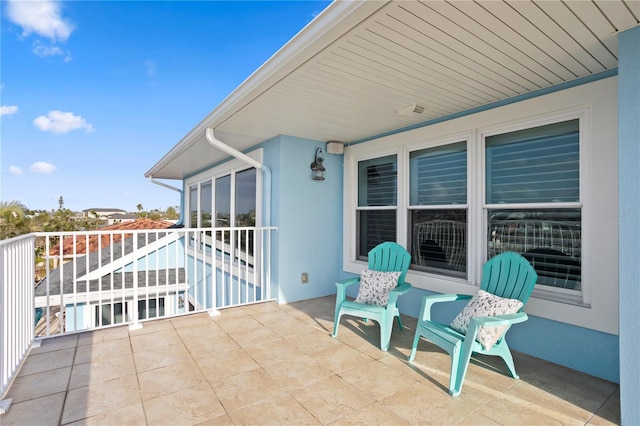 view of patio with a balcony