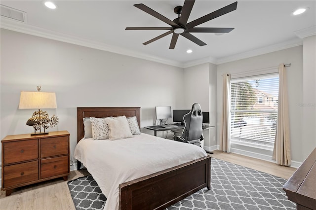 bedroom with crown molding, recessed lighting, visible vents, light wood-style flooring, and baseboards