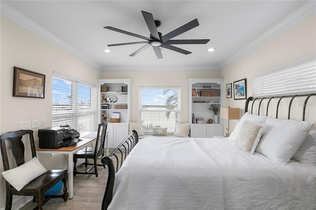 bedroom with ceiling fan, ornamental molding, light wood-type flooring, and recessed lighting