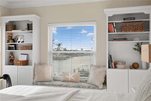 bedroom with crown molding