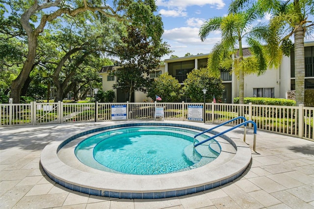 view of pool with fence