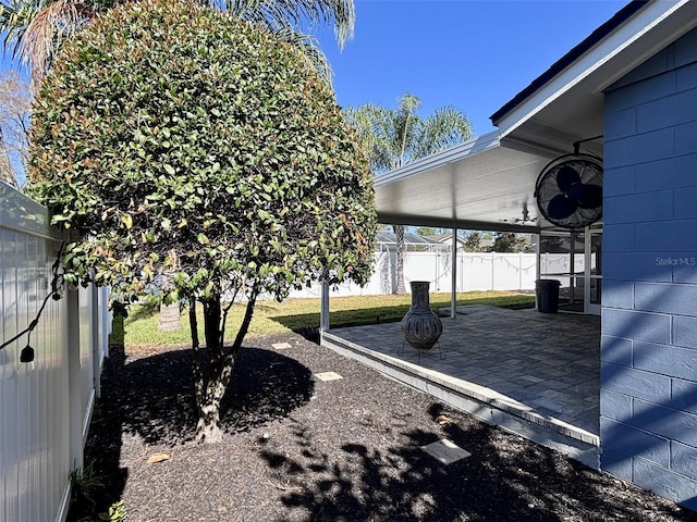 view of yard with a fenced backyard and a patio area