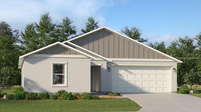 view of front of property with an attached garage, a front yard, board and batten siding, and concrete driveway