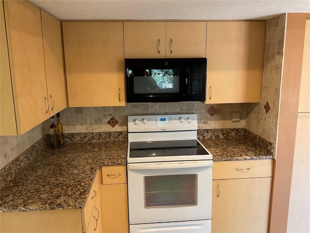 kitchen featuring white range with electric stovetop, black microwave, backsplash, and dark stone countertops