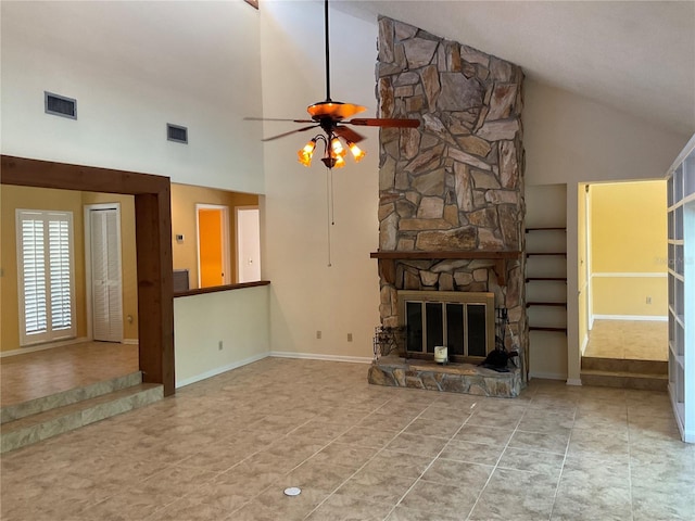 unfurnished living room with tile patterned floors, visible vents, a fireplace, and ceiling fan