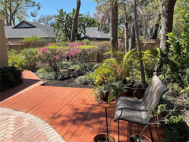 wooden deck featuring fence