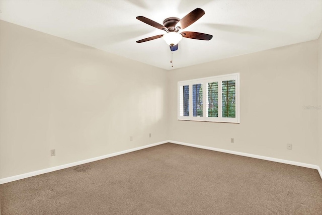 11712 Palmer Dr, Tampa, FL 33624 - spare room featuring dark colored carpet and ceiling fan