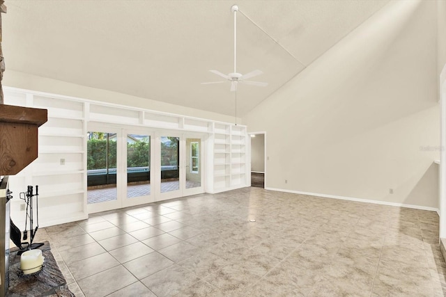 11712 Palmer Dr, Tampa, FL 33624 - unfurnished living room featuring ceiling fan, high vaulted ceiling, french doors, and tile patterned flooring