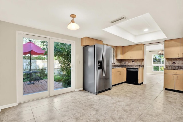 11712 Palmer Dr, Tampa, FL 33624 - kitchen featuring stainless steel fridge, dishwasher, a tray ceiling, and healthy amount of natural light