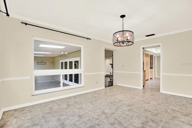 11712 Palmer Dr, Tampa, FL 33624 - tiled spare room featuring a chandelier and crown molding