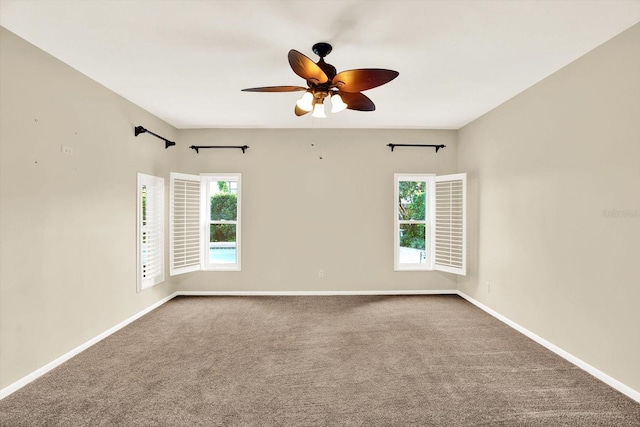 11712 Palmer Dr, Tampa, FL 33624 - carpeted spare room with ceiling fan and baseboards