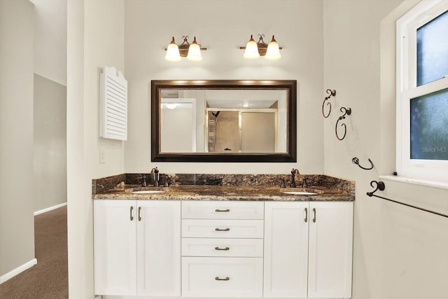 11712 Palmer Dr, Tampa, FL 33624 - bathroom featuring an enclosed shower and double vanity