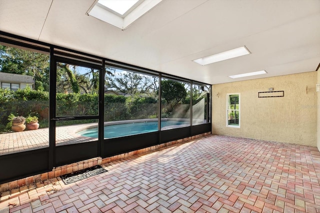 11712 Palmer Dr, Tampa, FL 33624 - unfurnished sunroom featuring a skylight