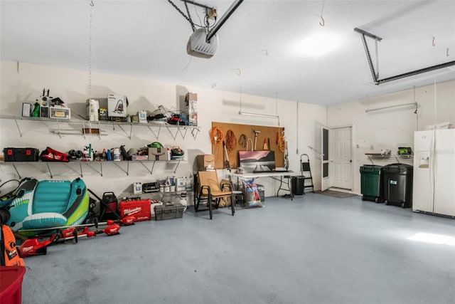 garage with white fridge with ice dispenser and a garage door opener