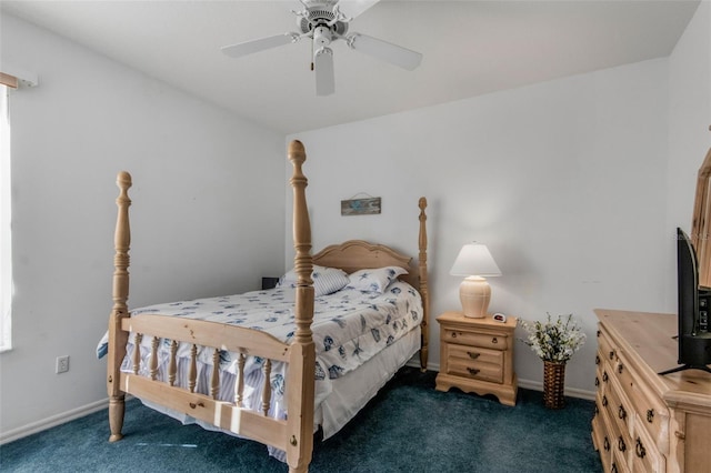 carpeted bedroom featuring ceiling fan and baseboards