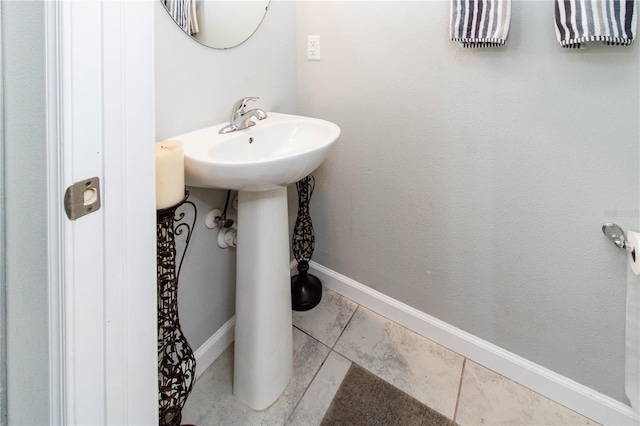 bathroom featuring baseboards